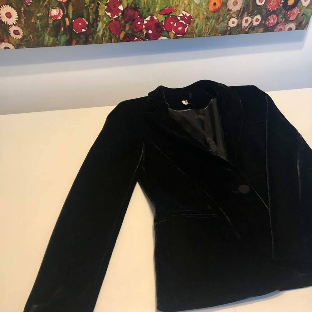 Luxurious black velvet jacket.